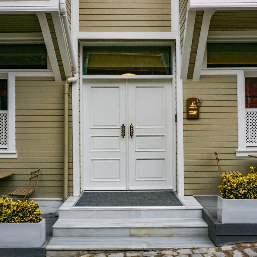 Door staining in Baton Rouge LA refinished these wood double entry doors with a UV rated topcoat