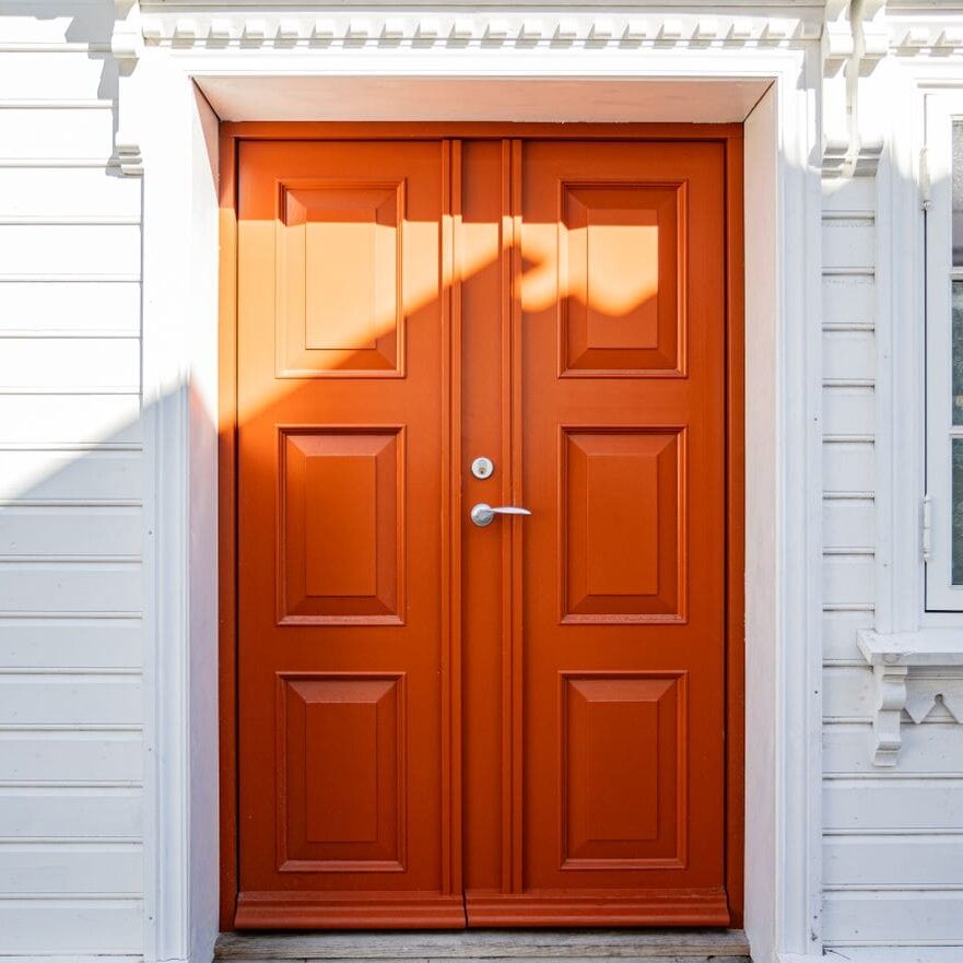 Door staining in Baton Rouge LA restored the wood front door on this home