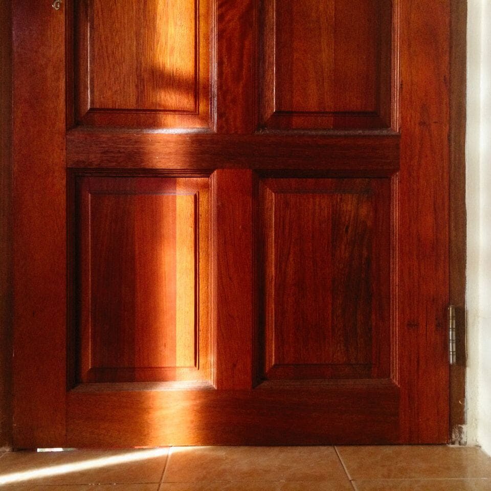 Door staining in Baton Rouge LA produced this smooth wood grain finish on a panel door